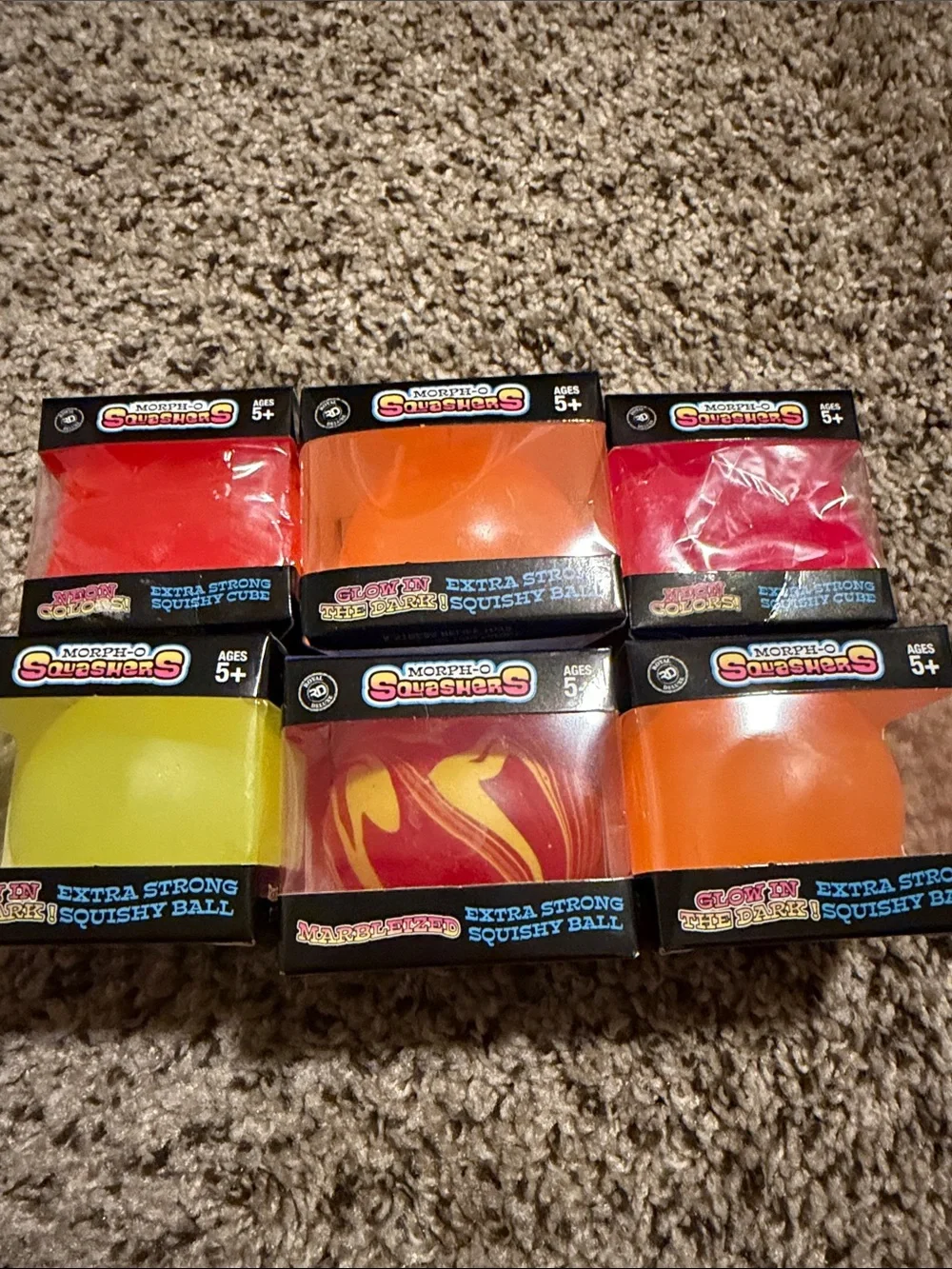Squishy Squeezers Glow Ball Pack — Yellow, Red, Orange, Pink